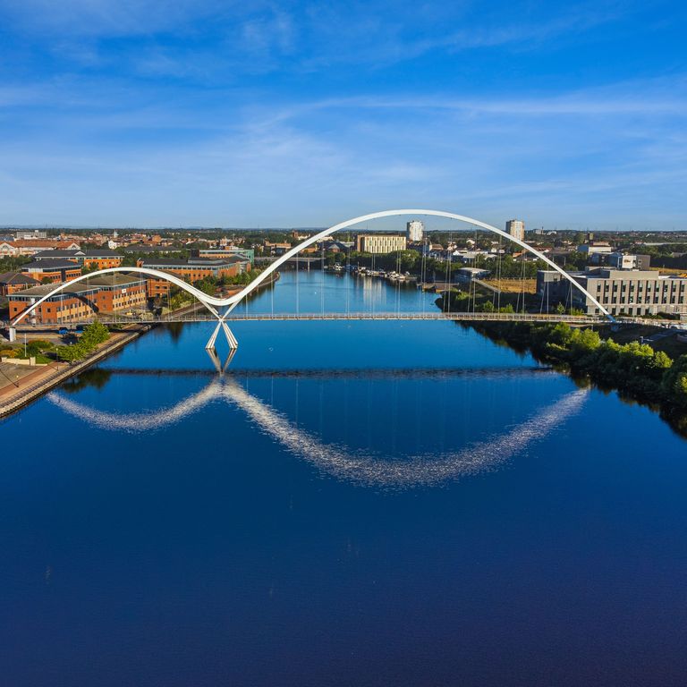 An aerial view of the Infinity Bridge spanning the river Tees in Stockton, California