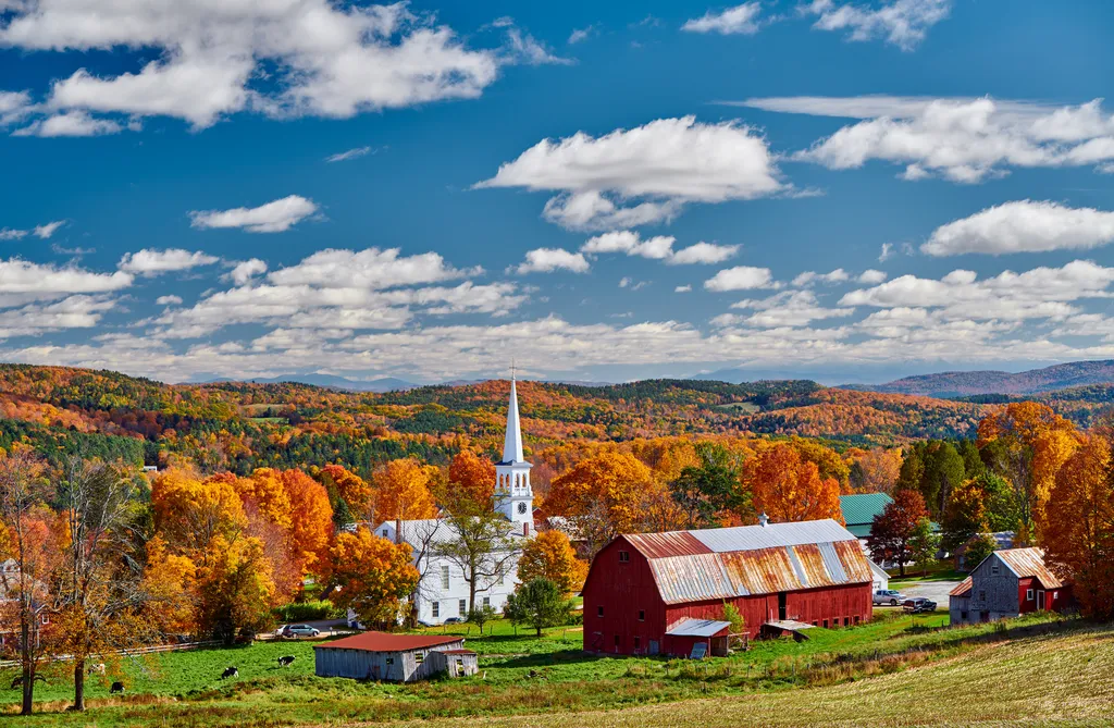 Rural Church With Barn in the Foreground In Vermont